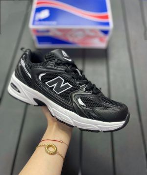 Кроссовки New Balance (Нью Баланс) 530 черные кожаные с сеткой