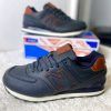 New Balance 574 синие с коричневым с мехом