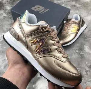 Женские New Balance 574 золотые