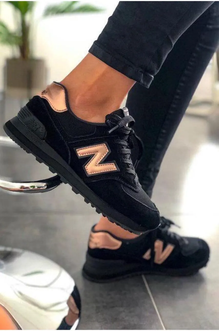 New Balance 574 черные с бронзой New Balance 574 черные с бронзой